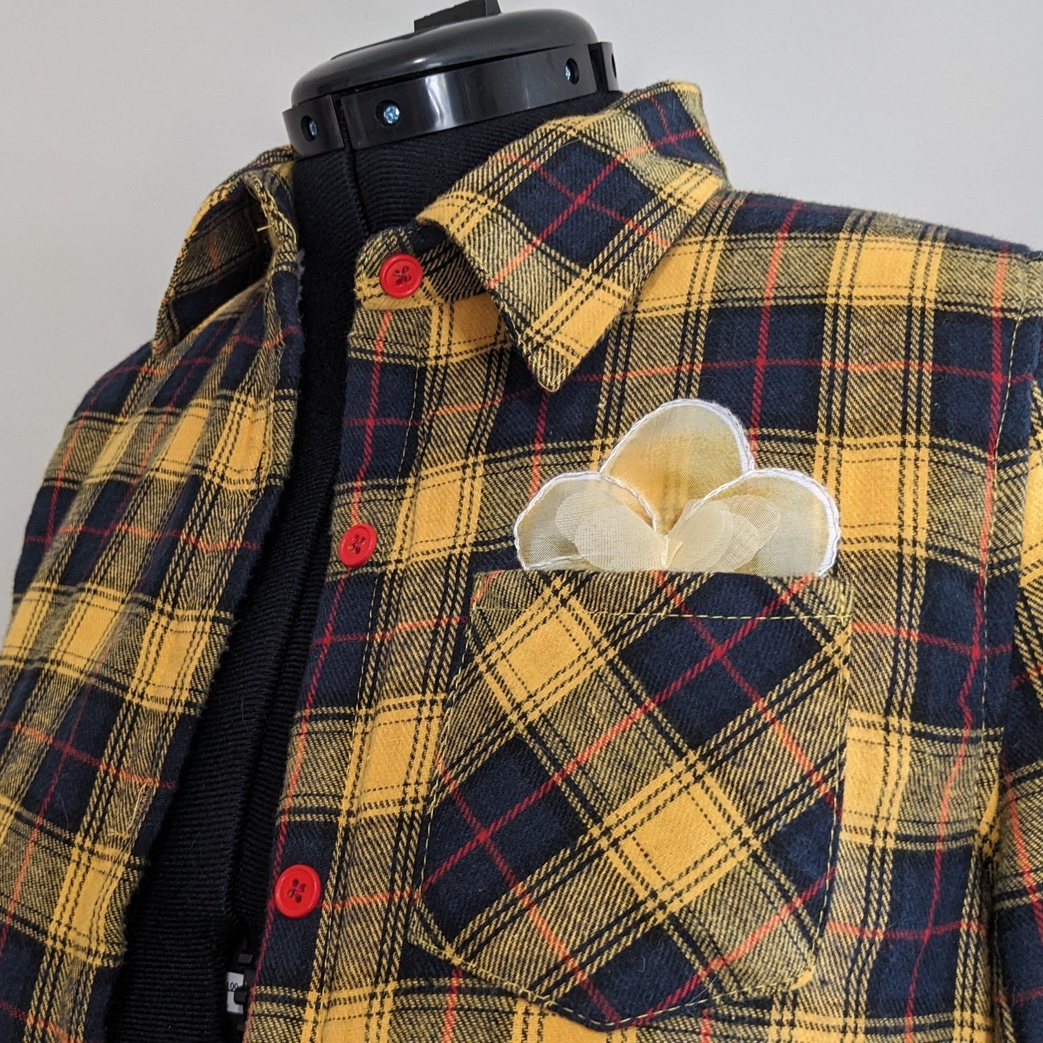 Yellow fuzzy flannel with floral accent and antique buttons