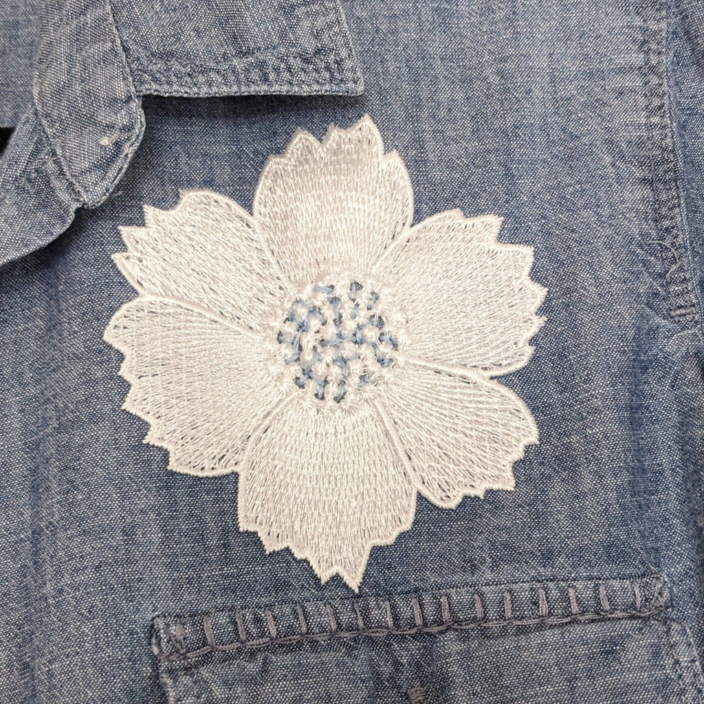 Jean shirt with white floral and antique buttons.