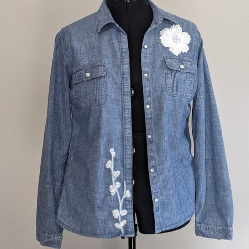 Jean shirt with white floral and antique buttons.