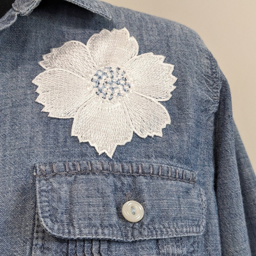 Jean shirt with white floral and antique buttons.