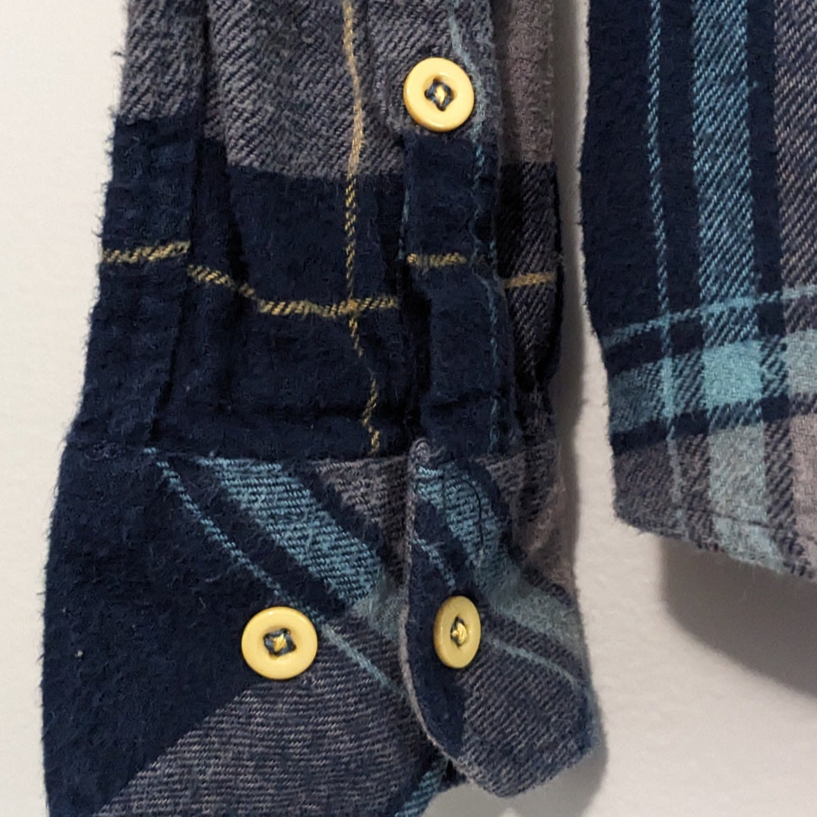Navy button-up flannel with snakes and antique buttons