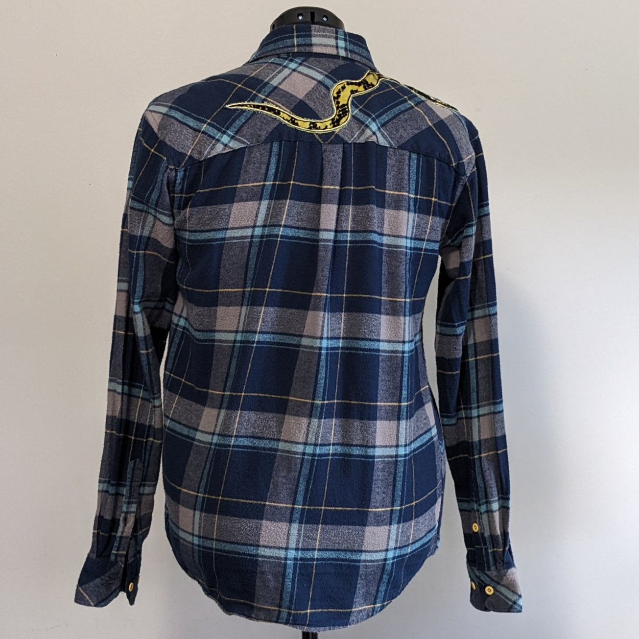 Navy button-up flannel with snakes and antique buttons