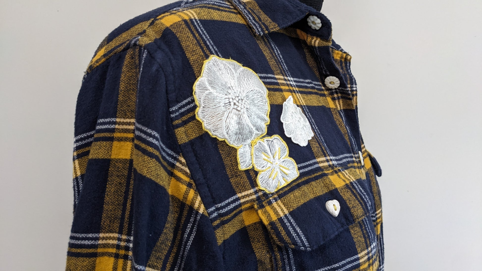Navy flannel with white floral and antique heart buttons