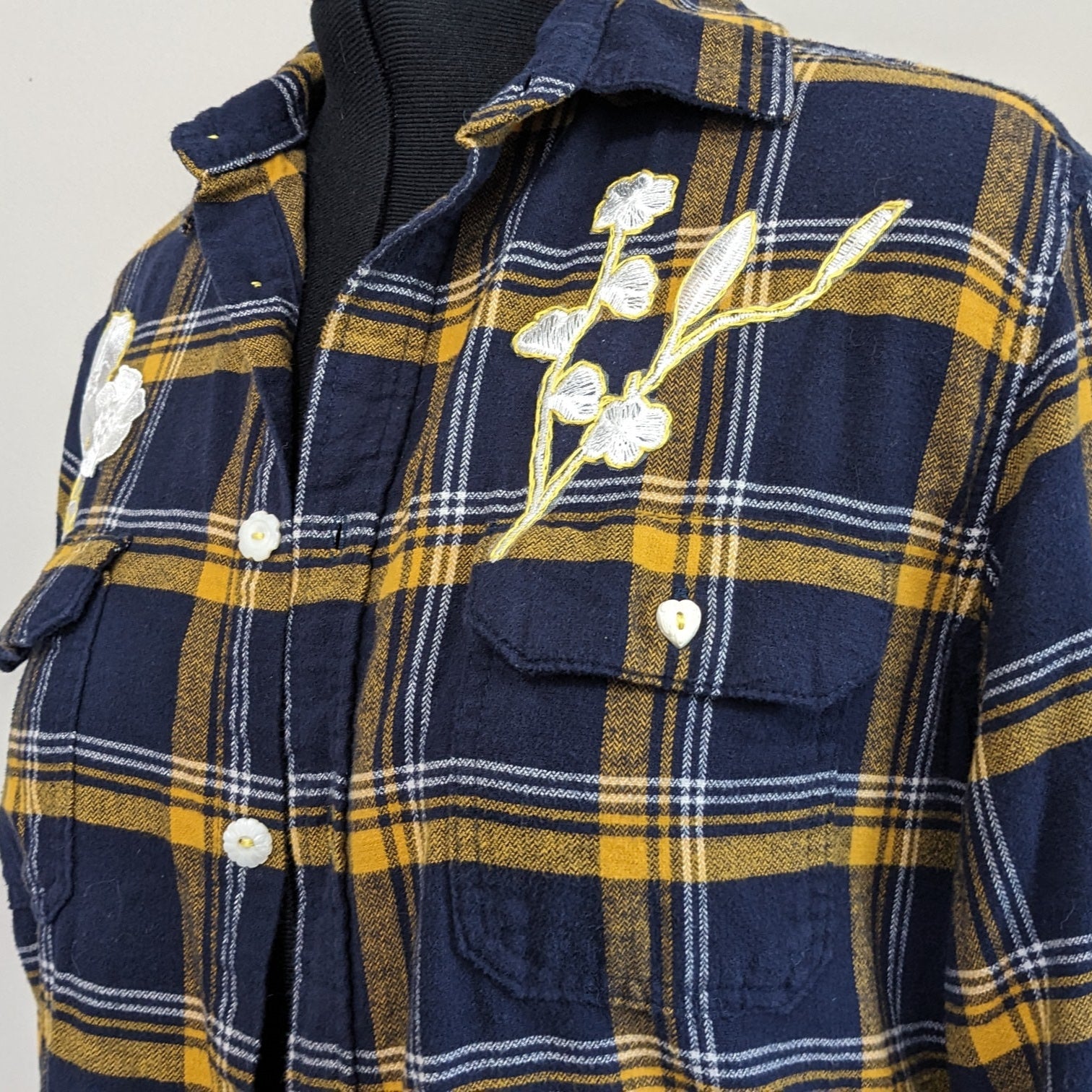 Navy flannel with white floral and antique heart buttons