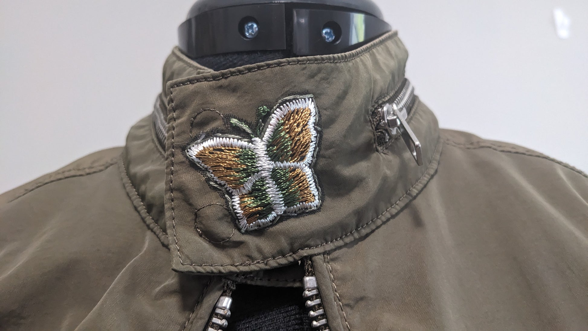 Green zip jacket with lace, floral and butterfly