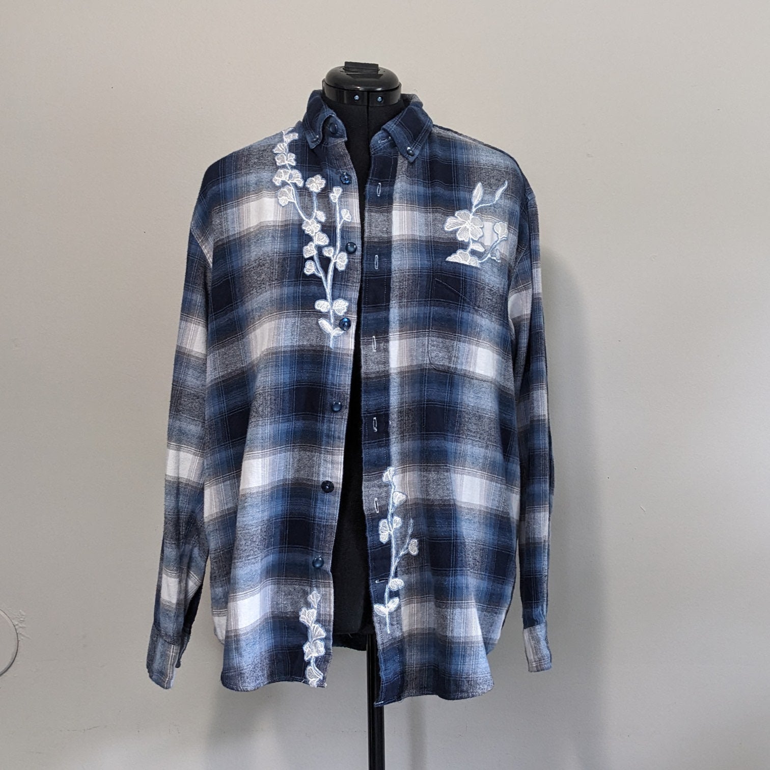 Blue and white flannel with white floral and antique buttons
