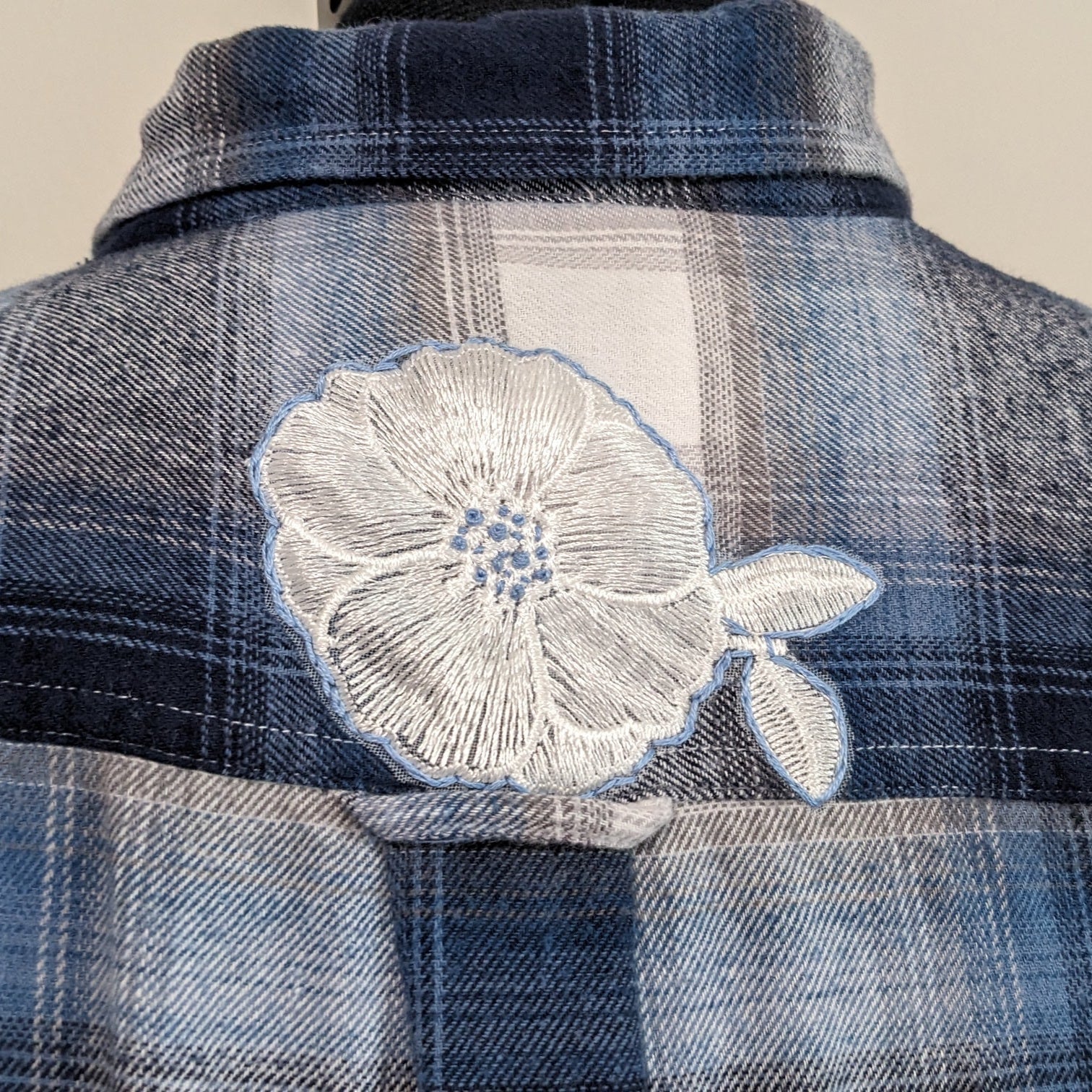 Blue and white flannel with white floral and antique buttons