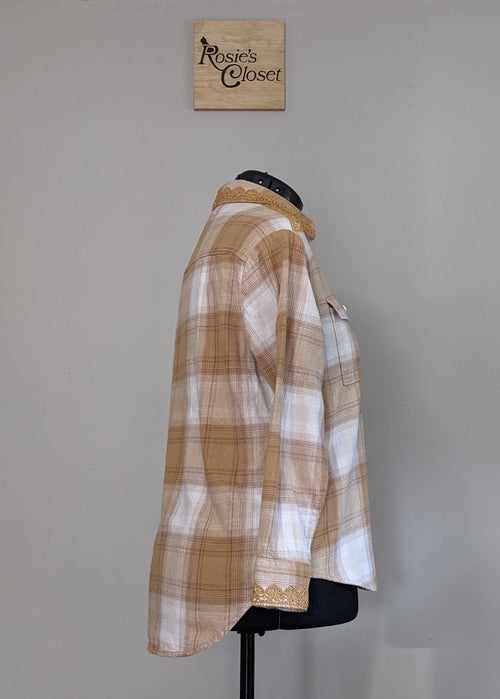 Plaid shirt on a mannequin against a plain wall with 'RC' branding.